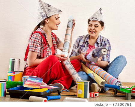 Repair home women holding Bank with paint for Repair home women holding Bank with paint for 37200761