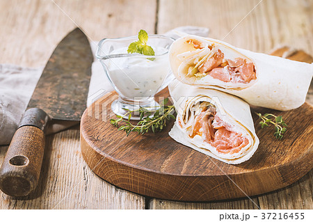 fresh tortilla wrap with salmon 37216455