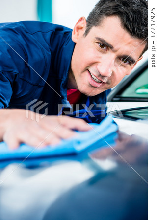 Man using an absorbent towel for drying the Man using an absorbent towel for drying the 37217925