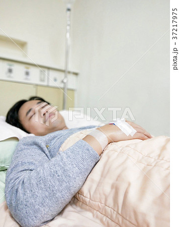 patient man on hospital bed 37217975