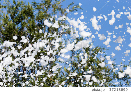 White foam at the festival as a background White foam at the festival as a background 37218699