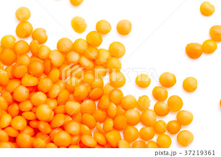 Red lentils on a white background 37219361