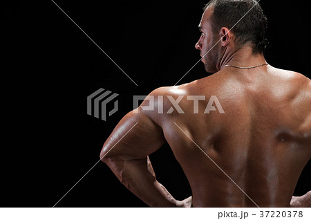Back view of bodybuilder with muscular relief body Back view of bodybuilder with muscular relief body 37220378
