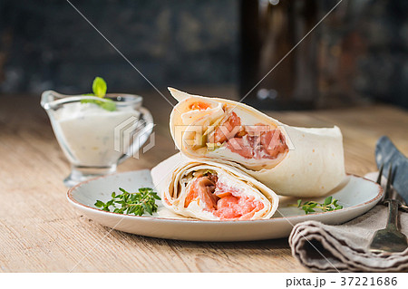 fresh tortilla wrap with salmon 37221686