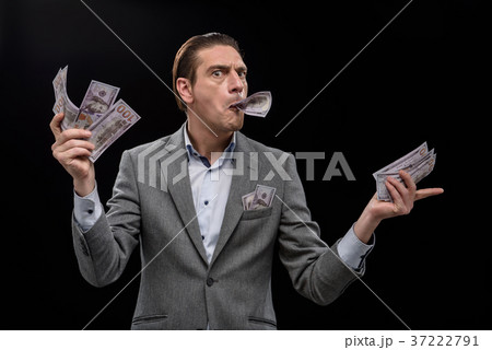 Confident young manager is demonstrating his 37222791