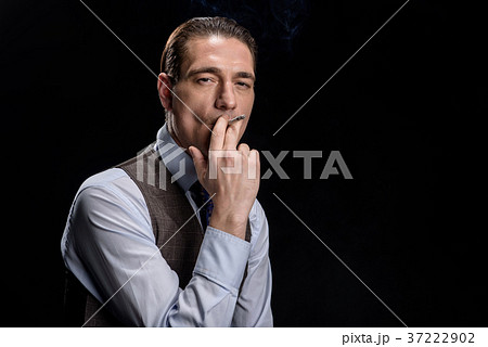 Young brutal man enjoying ciggy 37222902