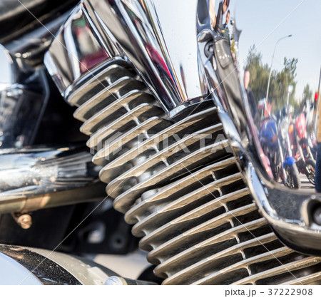 Chromed motorcycle parts on a sunny day 37222908