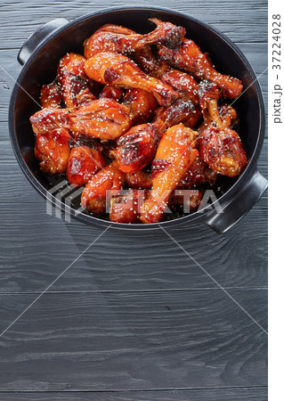 grilled teriyaki chicken legs, top view 37224028