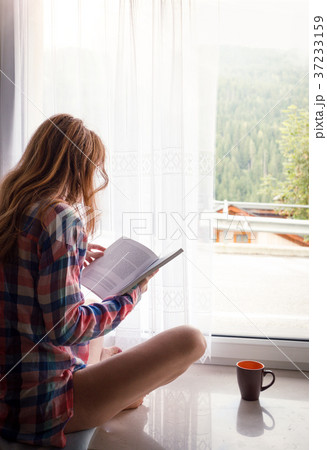girl on a windowsill 37233159
