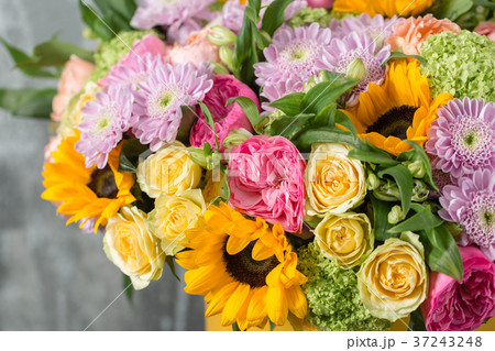 beautiful bouquet of mixed flowers in a vase on 37243248