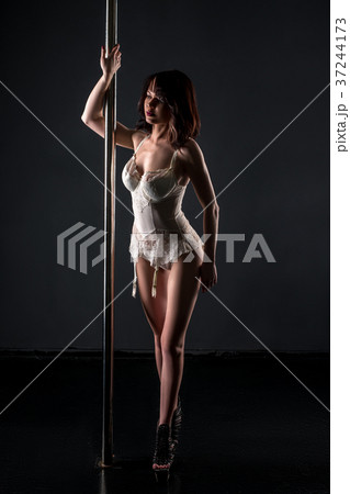 Pole dance. Dancer dressed in erotic lace lingerie 37244173