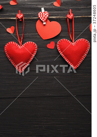 Valentine day background, handmade hearts on wood Valentine day background, handmade hearts on wood 37248605