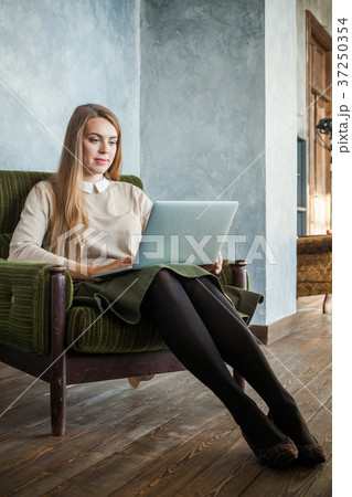 Cheerful Girl Using Laptop, Internet Shopping Cheerful Girl Using Laptop, Internet Shopping 37250354