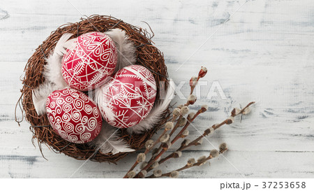 Pysanky, decorated Easter eggs in the nest Pysanky, decorated Easter eggs in the nest 37253658
