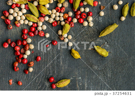 Closeup colorful spices mixture on dark background 37254631