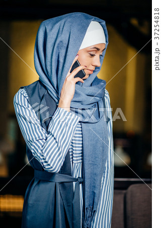 Successful Arab woman. Arab businesswoman wearing 37254818