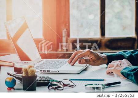 Businessman working with financial data 37265552