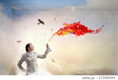 Woman spraying paint 37266094
