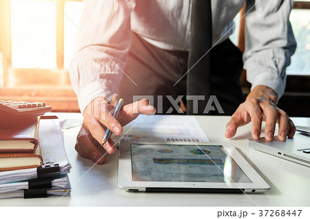 Businessman working with smart phone  37268447