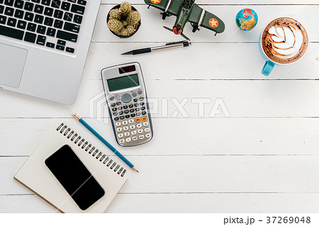 Modern white office desk table with laptop 37269048