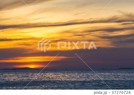The beautiful sky and sea at sunset. The beautiful sky and sea at sunset. 37270728