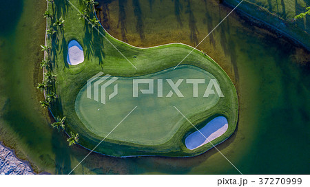 Aerial view of green golf course. Aerial view of green golf course. 37270999