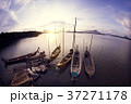 Wooden fishing boats with sunset scenery 37271178