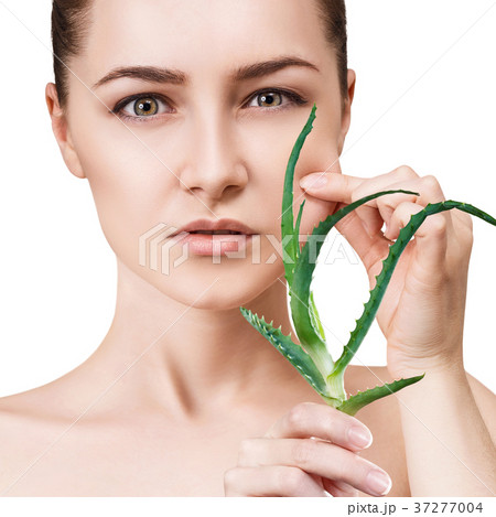 Woman with aloe vera plant and perfect skin. 37277004