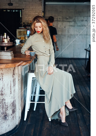 beautiful young girl in a long dress 37292085