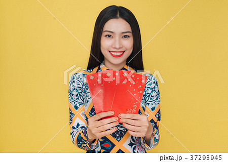 Attractive Vietnamese woman wearing AoDai 37293945