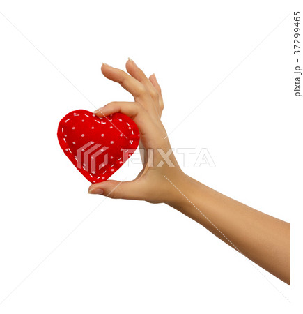Hand holding a red heart isolated Hand holding a red heart isolated 37299465
