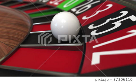 Casino roulette wheel ball hits 35 thirty-five 37306110