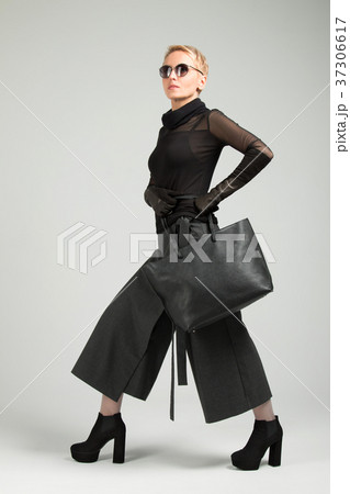 Girl in high-heeled shoes. Girl in high-heeled shoes. 37306617