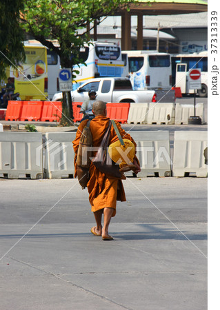 Buddhism monk Walking at Bus Station 37313339