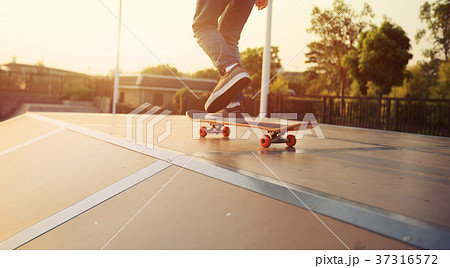 skateboarder legs skateboarding on skatepark ramp 37316572