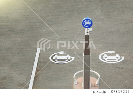 Color image of a parking spot for electric cars. Color image of a parking spot for electric cars. 37317215
