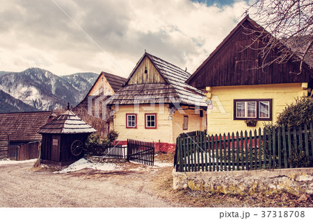 Colorful wooden houses in Vlkolinec village Colorful wooden houses in Vlkolinec village 37318708
