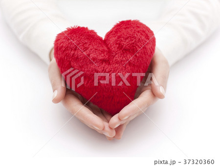 Red heart in woman hands  37320360