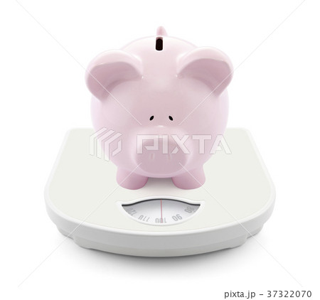 Piggy bank on scales  37322070