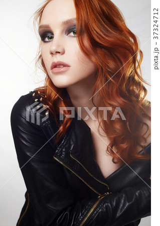 sexy Beautiful young woman in leather coat 37324712