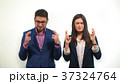 Colleagues crossed their fingers and closed their 37324764