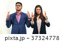 Business partners crossed their fingers and closed 37324778