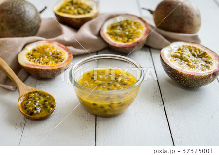 Passion fruit on white wooden background Passion fruit on white wooden background 37325001