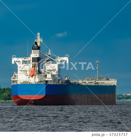 Blue cargo ship underway Blue cargo ship underway 37325737