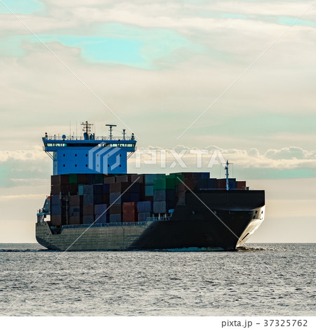 Black container ship underway Black container ship underway 37325762