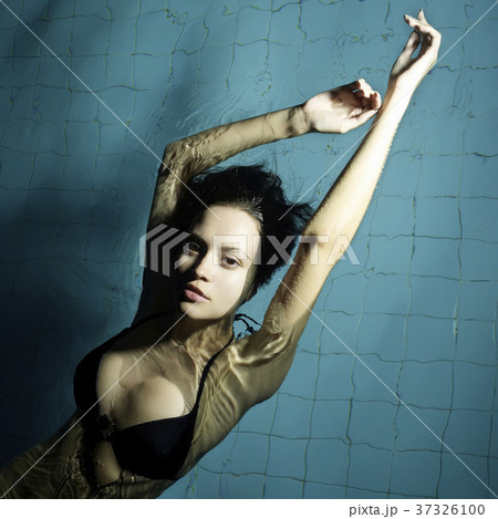 Beautiful young woman in the water Beautiful young woman in the water 37326100