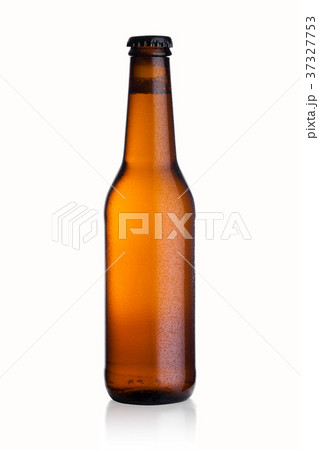 Brown glass beer bottle with black cap with dew 37327753