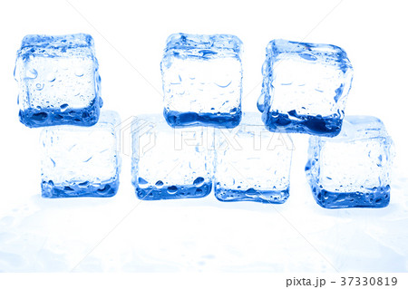 Blue ice cubes on white background. Blue ice cubes on white background. 37330819