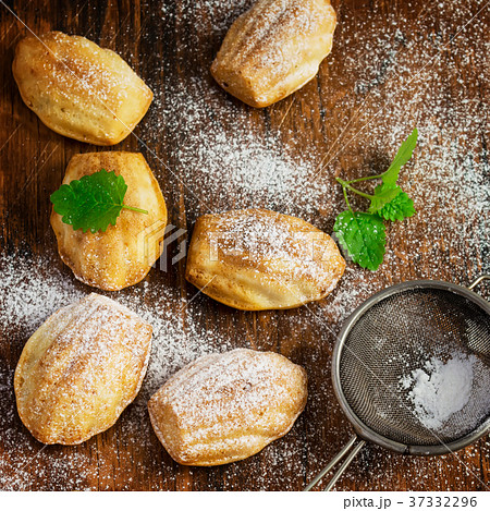 Madeleine biscuits on a vintage background 37332296