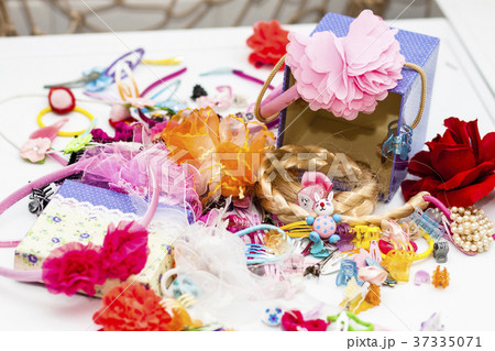 Colorful collection of girl stuff like barettes 37335071